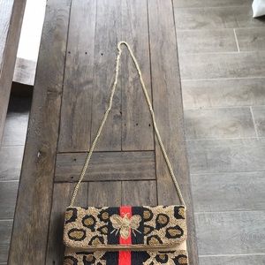 Beaded bee clutch/crossbody from Vici.